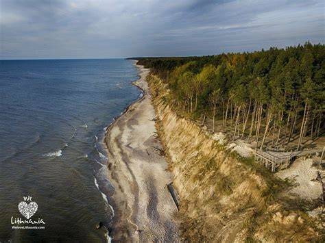 Olandų Kepurė viršūnė ir parabolinė kopa virš jūros
