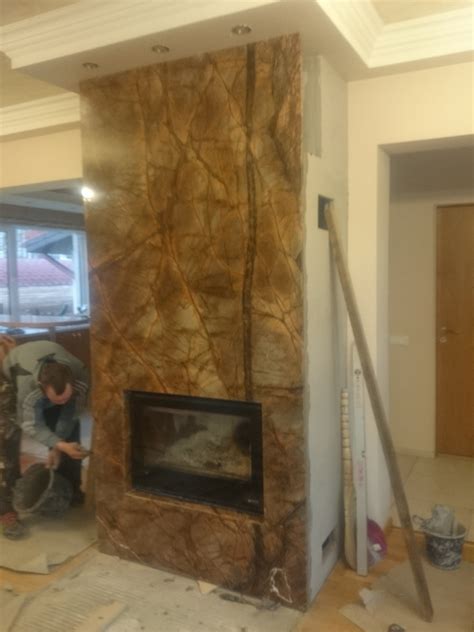 Keraminių plytelių pavyzdžiai židinio apdailai