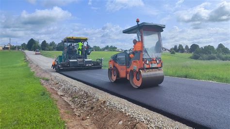 Asfaltavimo darbai: kelio tiesimas