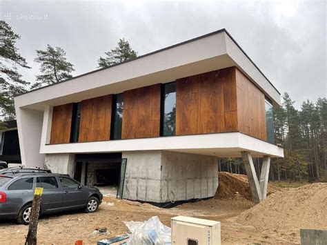 Fasadų apdaila medinėmis dailylentėmis