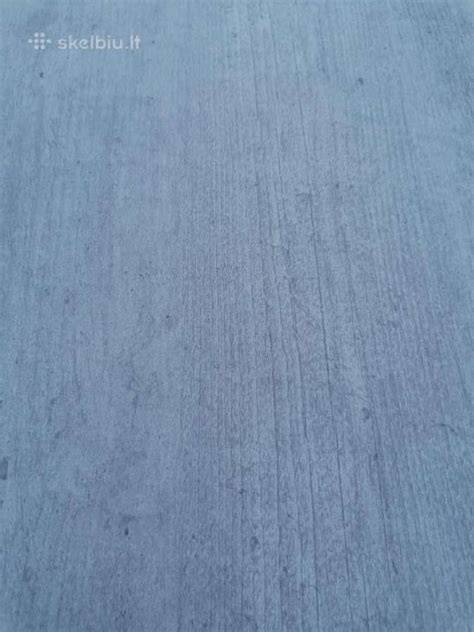 Naujos plastikinės dailylentės pilko betono imitacijoje