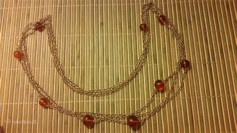 Senoviniai gintaro papuošalai