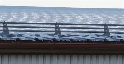 Stogo latakų ir sniego gaudytuvų sistema