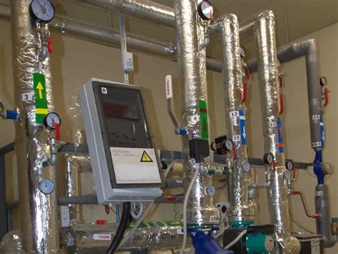 šildymo sistemos klojimas žemėje