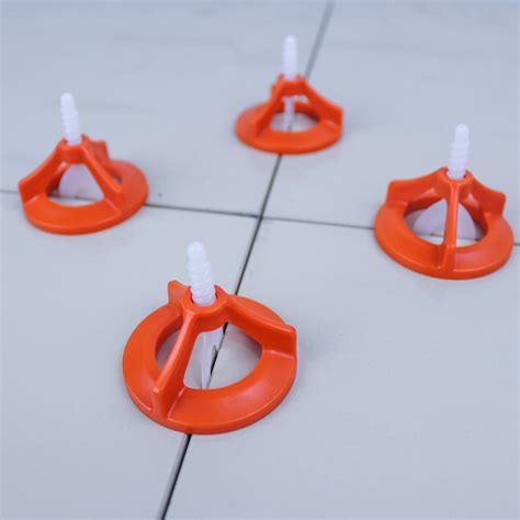 Plytelių kryžiukai ir išlyginimo sistemos