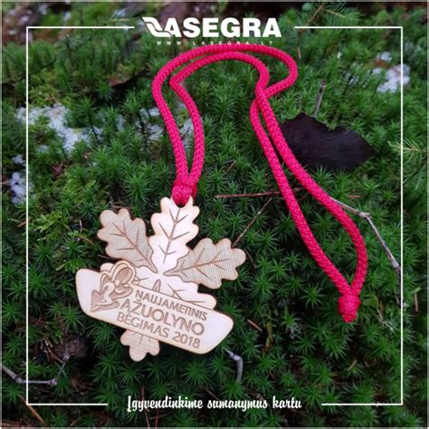 mediniai graviruoti medaliai