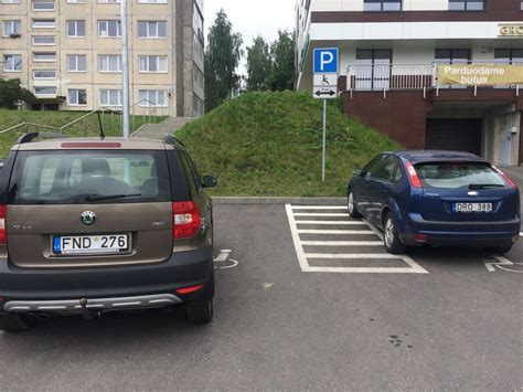 Neįgaliųjų stovėjimo vietos ženklinimas