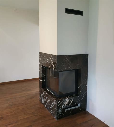 Modernus židinys su granito apdaila