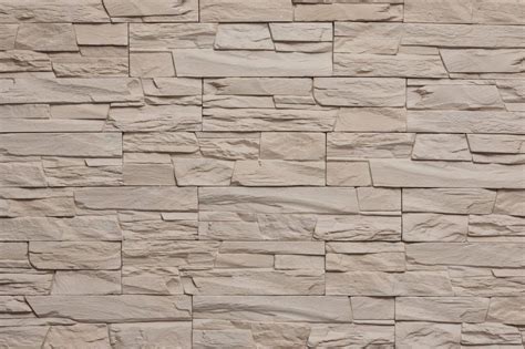 Akmens masės plytelės fasadui