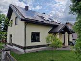 Namas su molio apdaila ir geoterminiu šildymu
