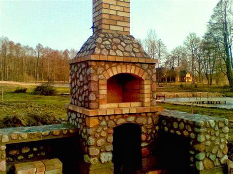 Lauko židinio aplinkos derinimo pavyzdžiai: pavėsinė, terasa, kiemo siena