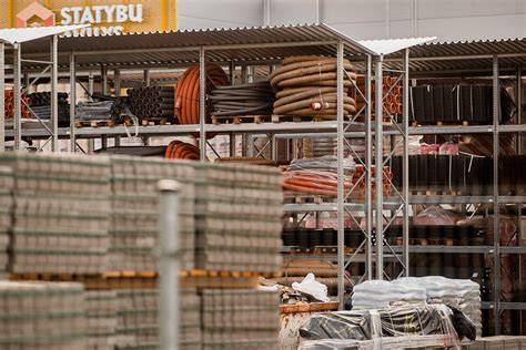 Statybinių medžiagų parduotuvės stendas su STIMELIT produktais