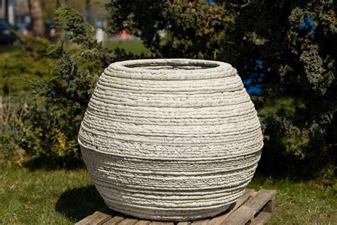 Betoniniai vazonai ir lauko dizaino sprendimai