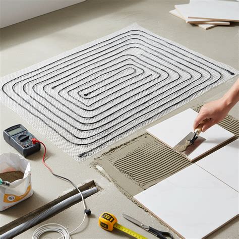 kilimėlis montuojamas po plytelėmis arba laminato sluoksniu