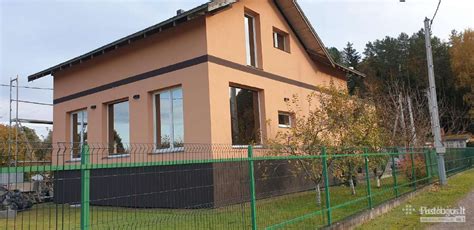 Įvairūs fasadų apdailos pavyzdžiai