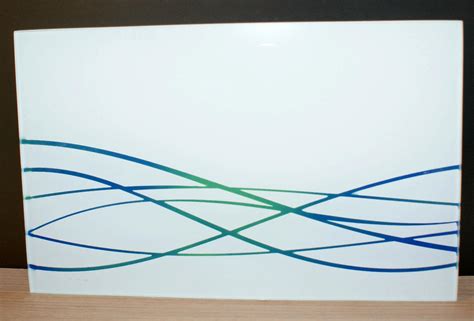 Virtuvės stiklo panelė su spalvotu dizainu