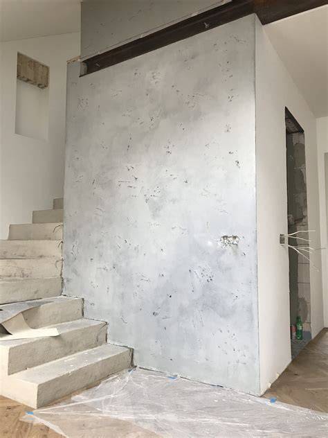 Betoninių sienų plokščių išorės dekoro pavyzdys: tekstūrinis tinkas