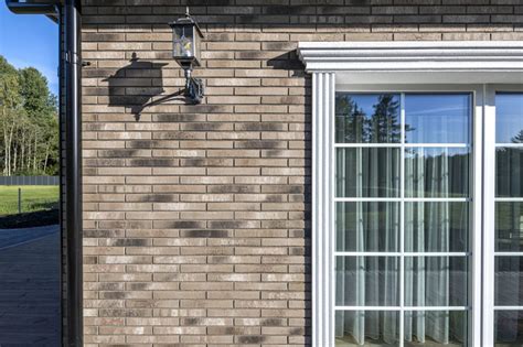 Klinkerinės plytelės namo fasadui